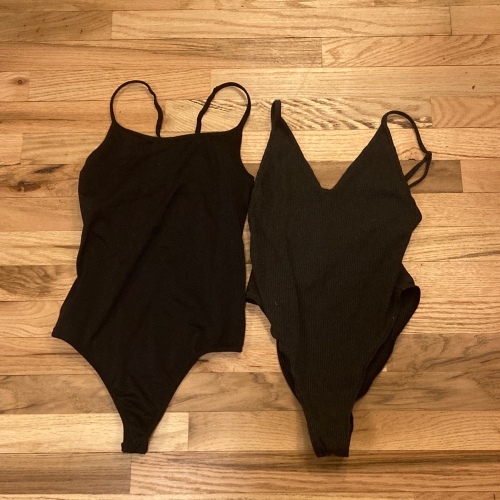 2 Women's Bodysuit’s one black one grey